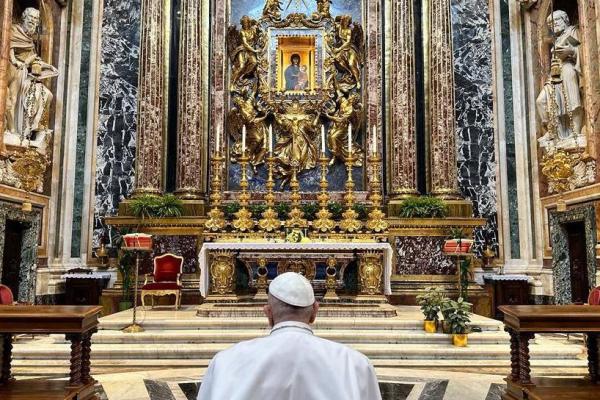 Pope Francis prays at the Basilica of St. Mary Major